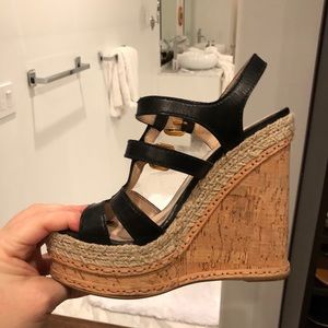 Prada black leather wedge.